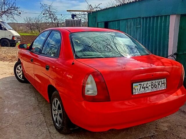 Красный Дэу Нубира, объемом двигателя 1.6 л и пробегом 306 тыс. км за 2000 $, фото 2 на Automoto.ua