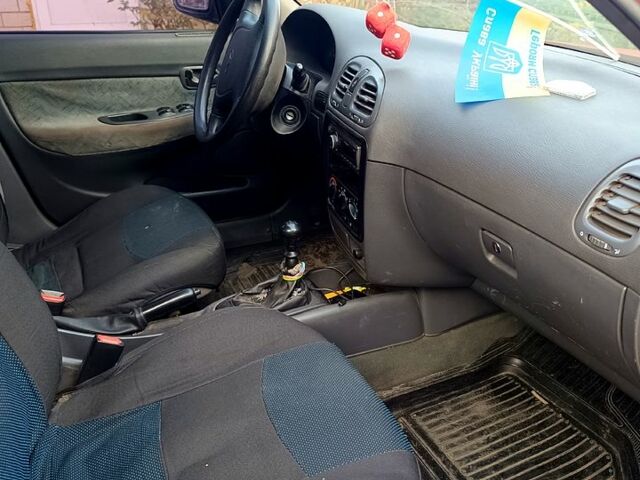 Красный Дэу Нубира, объемом двигателя 1.6 л и пробегом 183 тыс. км за 2500 $, фото 8 на Automoto.ua