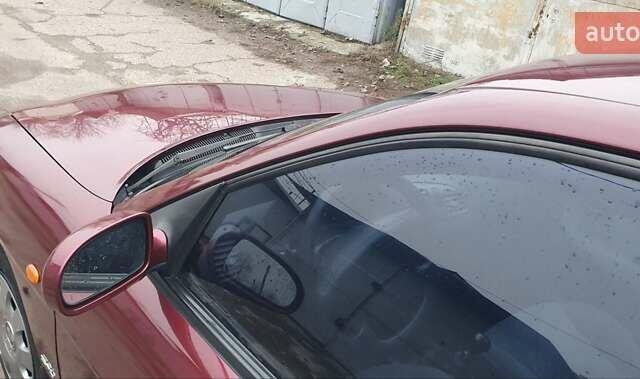 Красный Дэу Нубира, объемом двигателя 1.6 л и пробегом 275 тыс. км за 3700 $, фото 12 на Automoto.ua