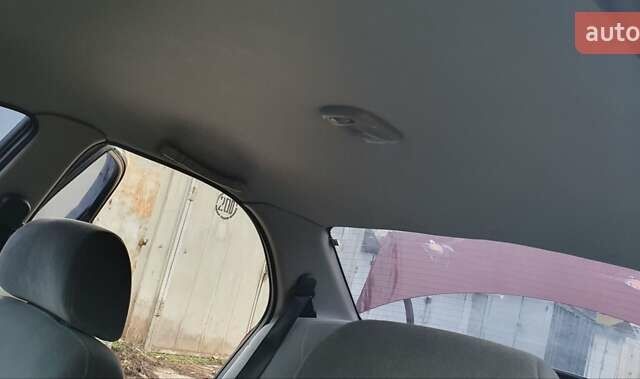 Красный Дэу Нубира, объемом двигателя 1.6 л и пробегом 275 тыс. км за 3700 $, фото 6 на Automoto.ua