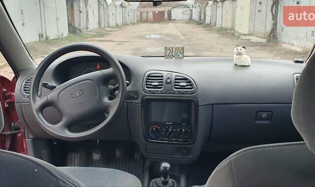 Красный Дэу Нубира, объемом двигателя 1.6 л и пробегом 275 тыс. км за 3700 $, фото 9 на Automoto.ua