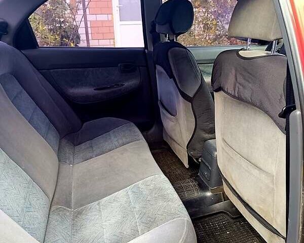 Красный Дэу Нубира, объемом двигателя 1.6 л и пробегом 183 тыс. км за 2500 $, фото 8 на Automoto.ua