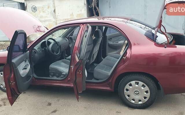 Красный Дэу Нубира, объемом двигателя 1.6 л и пробегом 275 тыс. км за 3700 $, фото 1 на Automoto.ua