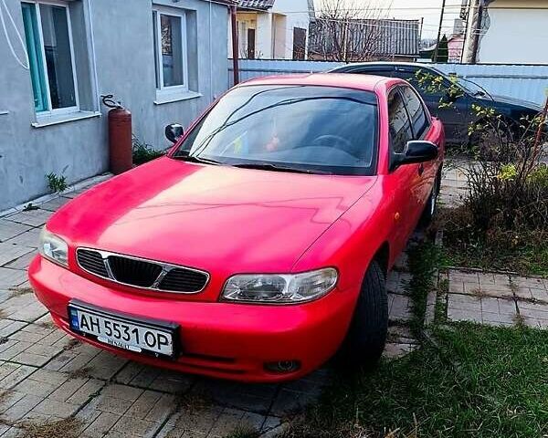 Красный Дэу Нубира, объемом двигателя 1.6 л и пробегом 183 тыс. км за 2500 $, фото 12 на Automoto.ua