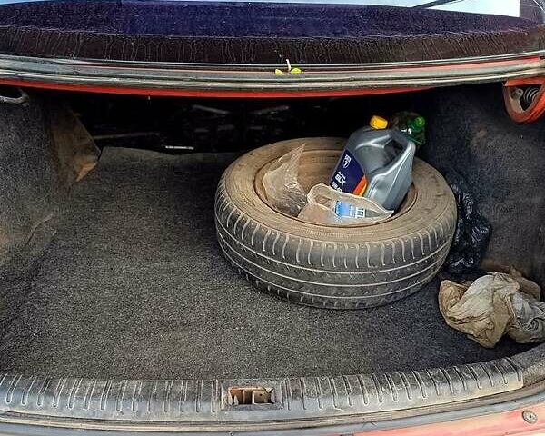 Красный Дэу Нубира, объемом двигателя 1.6 л и пробегом 183 тыс. км за 2500 $, фото 9 на Automoto.ua