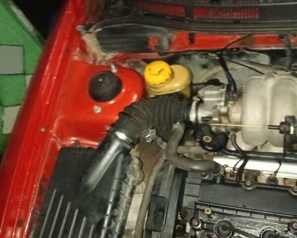 Красный Дэу Нубира, объемом двигателя 1.6 л и пробегом 250 тыс. км за 750 $, фото 1 на Automoto.ua