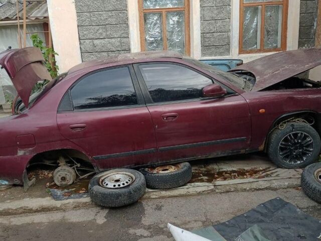 Красный Дэу Нубира, объемом двигателя 0 л и пробегом 1 тыс. км за 292 $, фото 4 на Automoto.ua
