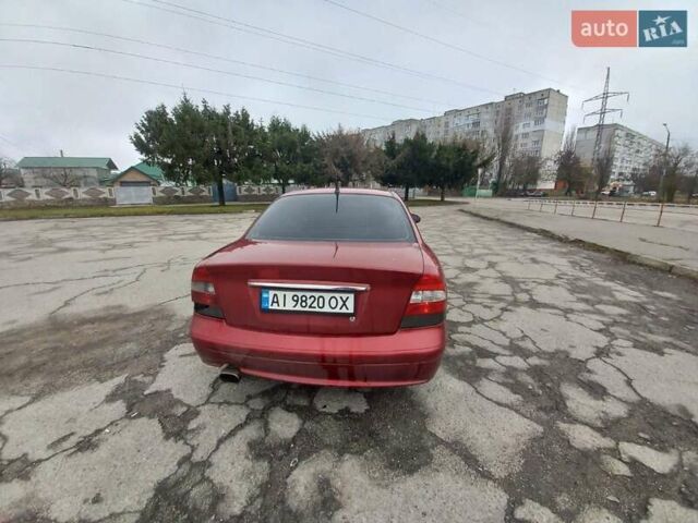 Красный Дэу Нубира, объемом двигателя 2 л и пробегом 350 тыс. км за 1500 $, фото 10 на Automoto.ua