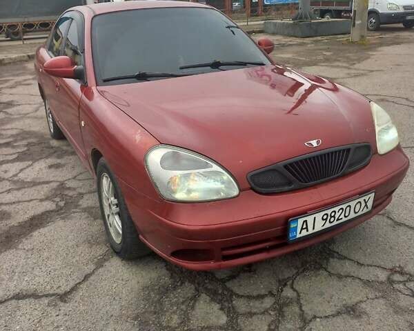 Красный Дэу Нубира, объемом двигателя 2 л и пробегом 350 тыс. км за 1500 $, фото 8 на Automoto.ua