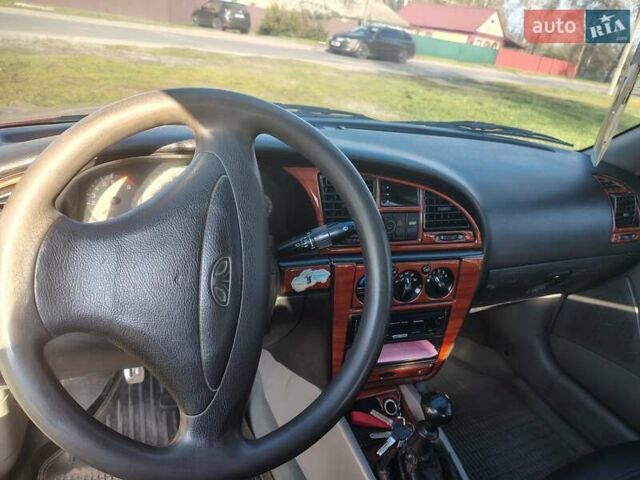 Красный Дэу Нубира, объемом двигателя 2 л и пробегом 370 тыс. км за 3100 $, фото 9 на Automoto.ua