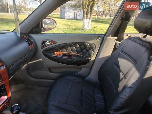 Красный Дэу Нубира, объемом двигателя 2 л и пробегом 370 тыс. км за 3100 $, фото 8 на Automoto.ua