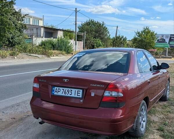 Красный Дэу Нубира, объемом двигателя 2 л и пробегом 383 тыс. км за 2800 $, фото 7 на Automoto.ua