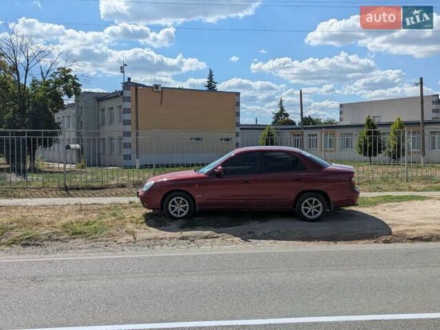 Красный Дэу Нубира, объемом двигателя 2 л и пробегом 383 тыс. км за 2800 $, фото 10 на Automoto.ua