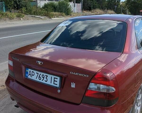 Красный Дэу Нубира, объемом двигателя 2 л и пробегом 383 тыс. км за 2800 $, фото 5 на Automoto.ua