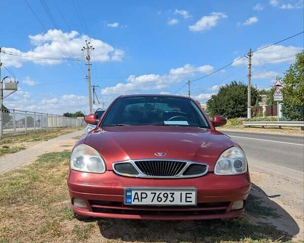 Красный Дэу Нубира, объемом двигателя 2 л и пробегом 383 тыс. км за 2800 $, фото 9 на Automoto.ua