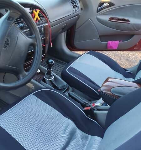 Красный Дэу Нубира, объемом двигателя 2 л и пробегом 300 тыс. км за 1499 $, фото 8 на Automoto.ua