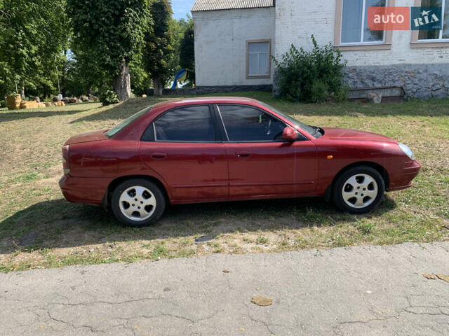 Красный Дэу Нубира, объемом двигателя 2 л и пробегом 314 тыс. км за 3000 $, фото 2 на Automoto.ua