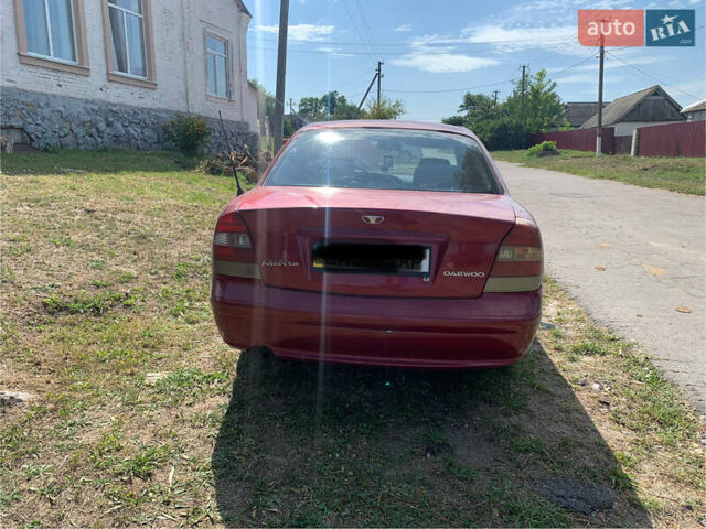 Красный Дэу Нубира, объемом двигателя 2 л и пробегом 314 тыс. км за 3000 $, фото 6 на Automoto.ua