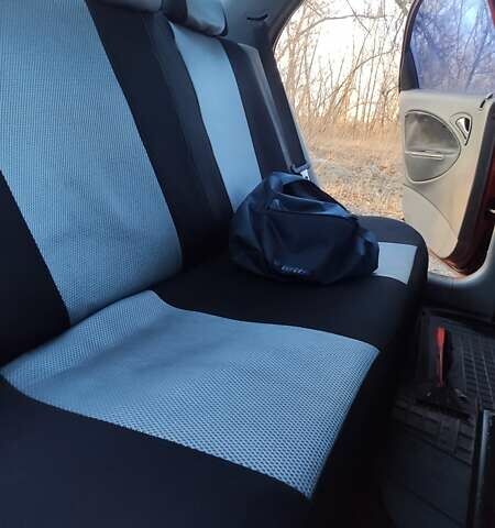 Красный Дэу Нубира, объемом двигателя 2 л и пробегом 300 тыс. км за 1499 $, фото 2 на Automoto.ua