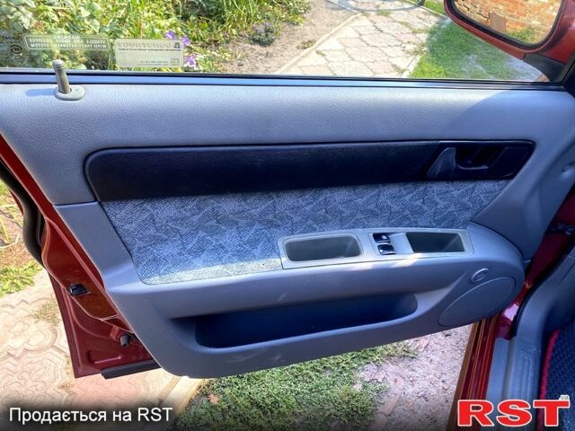 Червоний Деу Нубіра, об'ємом двигуна 1.6 л та пробігом 225 тис. км за 3500 $, фото 3 на Automoto.ua