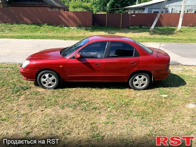 Красный Дэу Нубира, объемом двигателя 2 л и пробегом 314 тыс. км за 3000 $, фото 1 на Automoto.ua