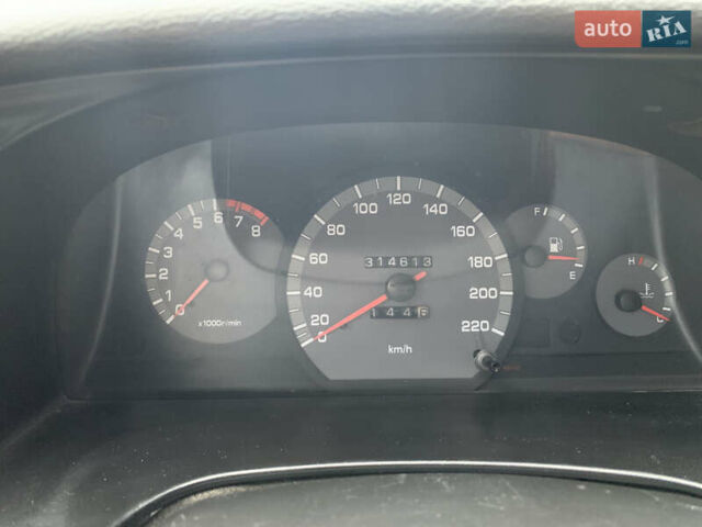 Красный Дэу Нубира, объемом двигателя 2 л и пробегом 314 тыс. км за 3000 $, фото 4 на Automoto.ua