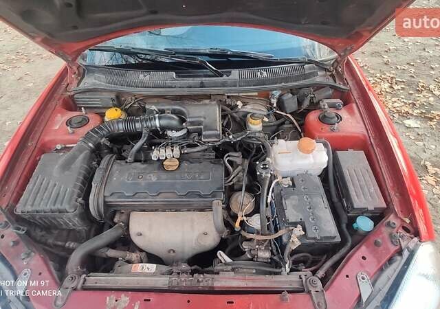 Красный Дэу Нубира, объемом двигателя 2 л и пробегом 300 тыс. км за 1499 $, фото 7 на Automoto.ua