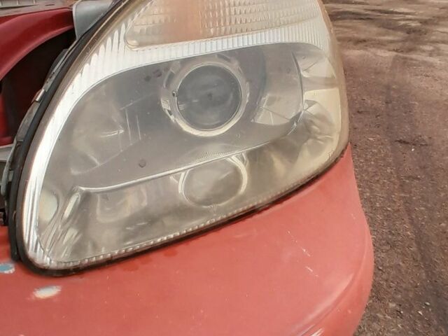 Червоний Деу Нубіра, об'ємом двигуна 2 л та пробігом 321 тис. км за 1600 $, фото 9 на Automoto.ua