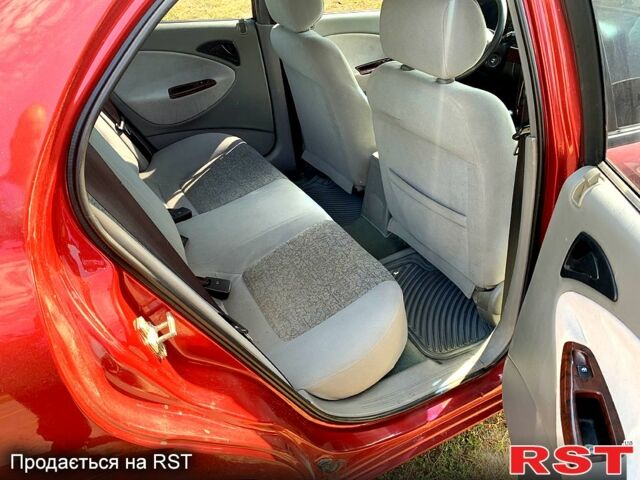 Красный Дэу Нубира, объемом двигателя 2 л и пробегом 314 тыс. км за 3000 $, фото 4 на Automoto.ua