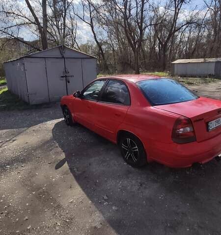 Красный Дэу Нубира, объемом двигателя 2 л и пробегом 300 тыс. км за 1750 $, фото 3 на Automoto.ua