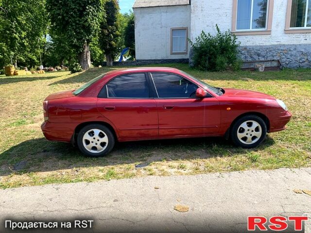 Красный Дэу Нубира, объемом двигателя 2 л и пробегом 314 тыс. км за 3000 $, фото 7 на Automoto.ua