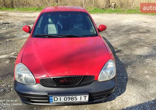 Красный Дэу Нубира, объемом двигателя 2 л и пробегом 300 тыс. км за 1499 $, фото 9 на Automoto.ua