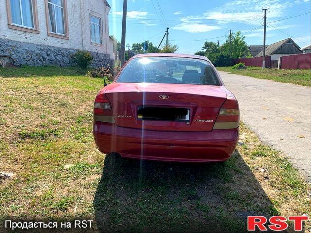 Красный Дэу Нубира, объемом двигателя 2 л и пробегом 314 тыс. км за 3000 $, фото 3 на Automoto.ua