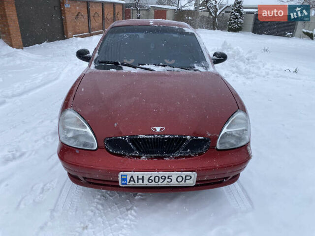 Красный Дэу Нубира, объемом двигателя 2 л и пробегом 300 тыс. км за 1000 $, фото 5 на Automoto.ua