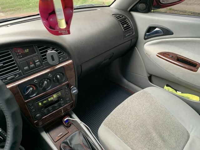 Червоний Деу Нубіра, об'ємом двигуна 2 л та пробігом 314 тис. км за 3000 $, фото 3 на Automoto.ua