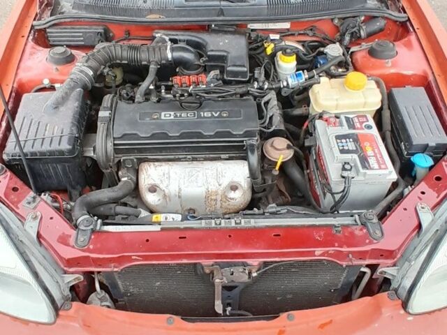 Червоний Деу Нубіра, об'ємом двигуна 2 л та пробігом 321 тис. км за 1600 $, фото 8 на Automoto.ua