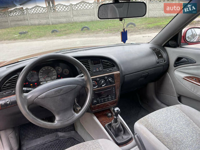 Красный Дэу Нубира, объемом двигателя 2 л и пробегом 150 тыс. км за 2450 $, фото 5 на Automoto.ua