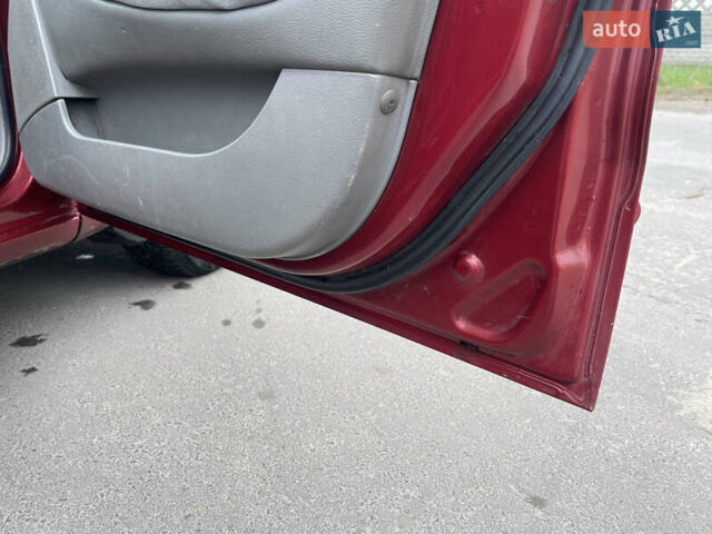 Красный Дэу Нубира, объемом двигателя 2 л и пробегом 150 тыс. км за 2450 $, фото 8 на Automoto.ua