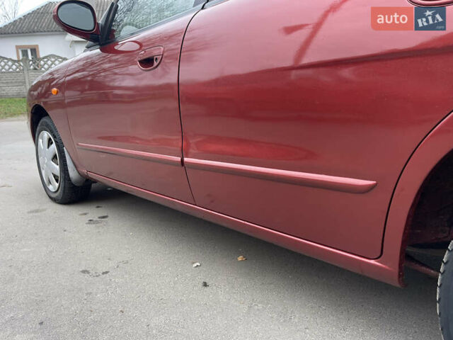 Красный Дэу Нубира, объемом двигателя 2 л и пробегом 150 тыс. км за 2450 $, фото 7 на Automoto.ua