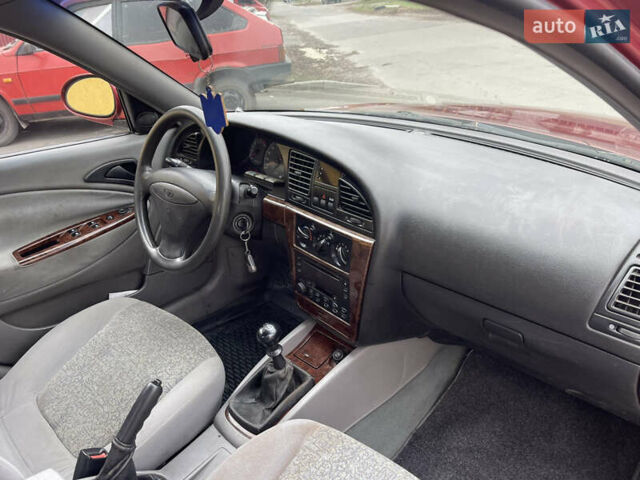 Красный Дэу Нубира, объемом двигателя 2 л и пробегом 150 тыс. км за 2450 $, фото 9 на Automoto.ua