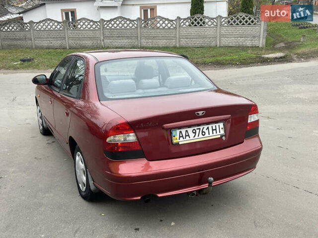 Красный Дэу Нубира, объемом двигателя 2 л и пробегом 150 тыс. км за 2450 $, фото 4 на Automoto.ua