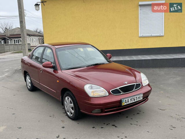 Красный Дэу Нубира, объемом двигателя 2 л и пробегом 150 тыс. км за 2450 $, фото 2 на Automoto.ua