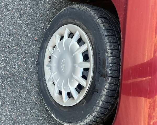 Красный Дэу Нубира, объемом двигателя 1.6 л и пробегом 190 тыс. км за 2350 $, фото 24 на Automoto.ua