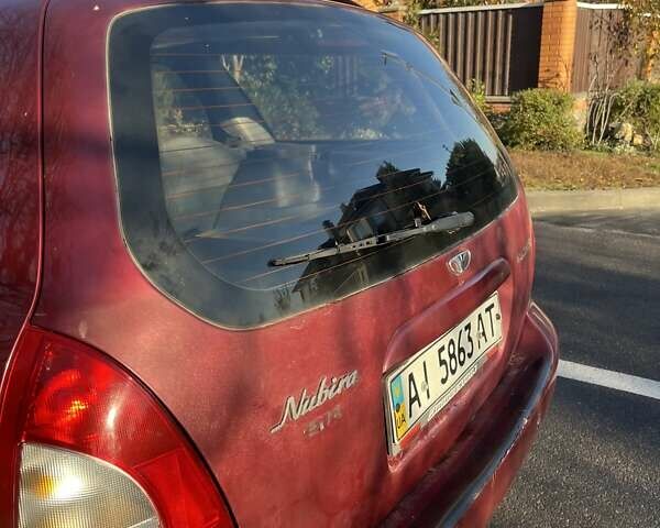 Красный Дэу Нубира, объемом двигателя 1.6 л и пробегом 190 тыс. км за 2350 $, фото 17 на Automoto.ua