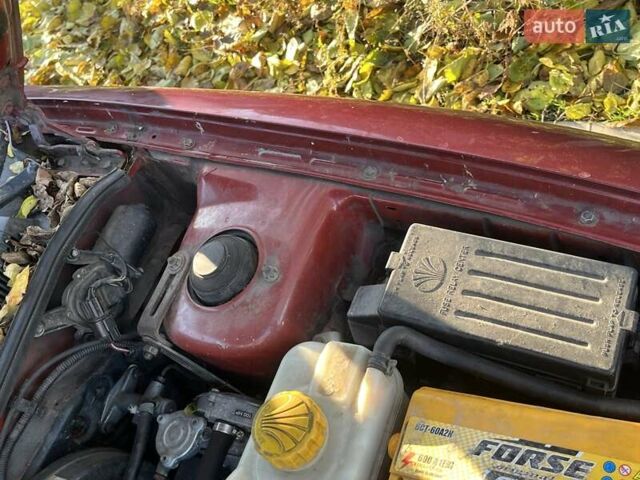 Красный Дэу Нубира, объемом двигателя 1.6 л и пробегом 190 тыс. км за 2350 $, фото 26 на Automoto.ua