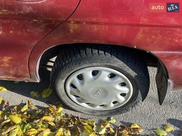 Красный Дэу Нубира, объемом двигателя 1.6 л и пробегом 190 тыс. км за 2350 $, фото 19 на Automoto.ua