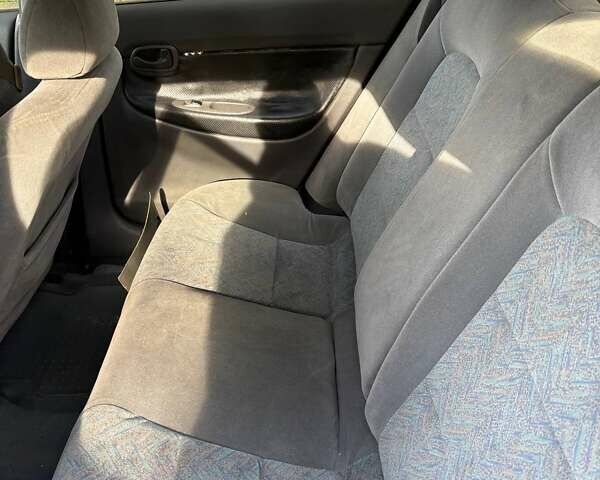 Красный Дэу Нубира, объемом двигателя 1.6 л и пробегом 190 тыс. км за 2350 $, фото 32 на Automoto.ua