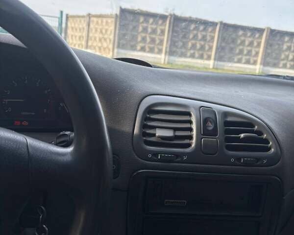 Красный Дэу Нубира, объемом двигателя 1.6 л и пробегом 190 тыс. км за 2350 $, фото 38 на Automoto.ua