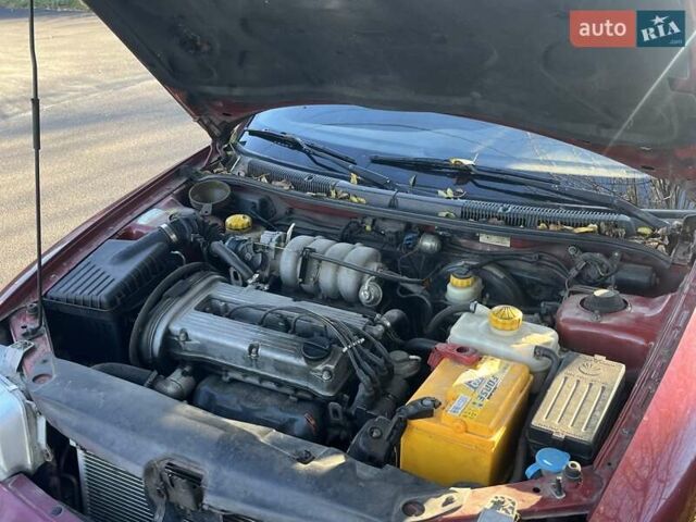 Красный Дэу Нубира, объемом двигателя 1.6 л и пробегом 190 тыс. км за 2350 $, фото 27 на Automoto.ua