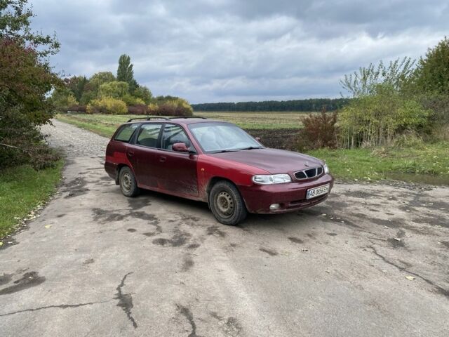 Червоний Деу Нубіра, об'ємом двигуна 2 л та пробігом 300 тис. км за 950 $, фото 3 на Automoto.ua